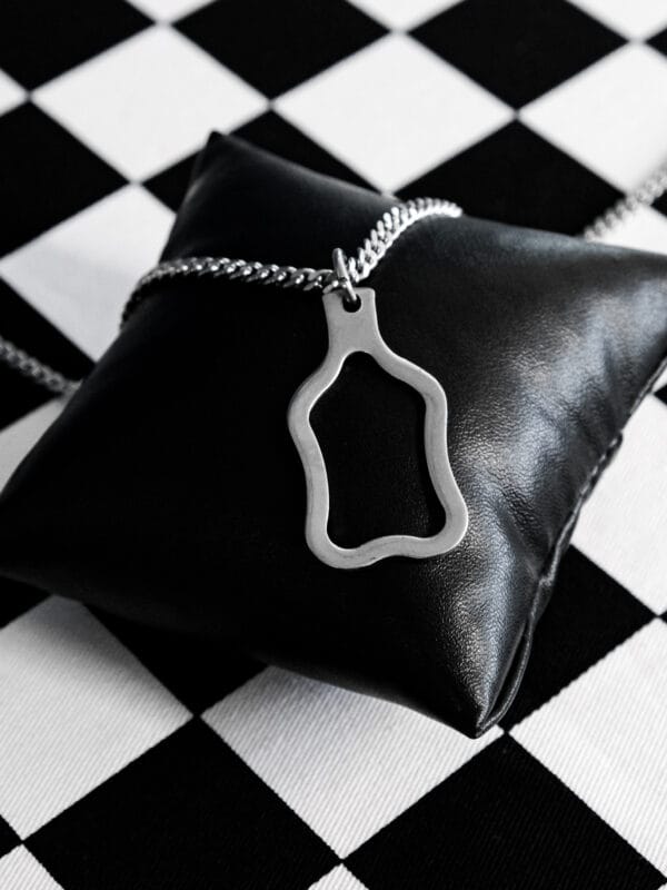 Curvy Tong Pendant