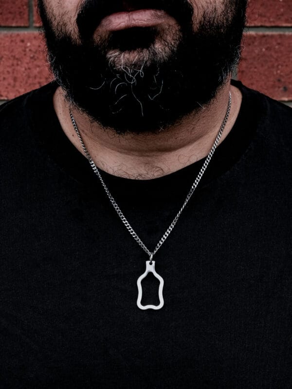 Curvy Tong Pendant